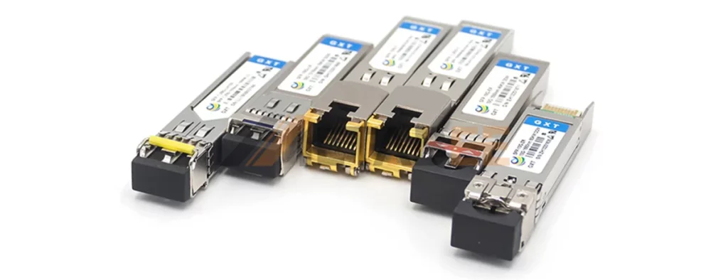 A collection of different SFP transceivers, displaying both LC fiber connectors and copper RJ45 interfaces.